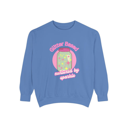 Blue sweatshirt with a pastel colored jar graphic and retro style pink text 