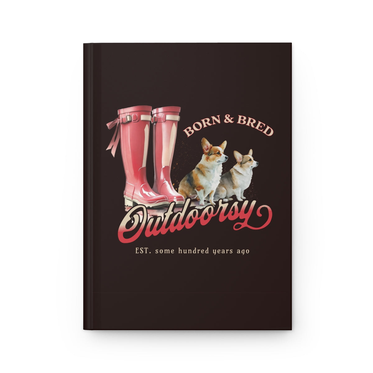 Hardcover brown notebook with red Wellington boots and Corgi dogs design that has texts "born & bred", "outdoorsy" 