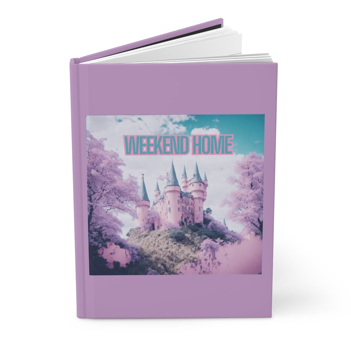 Pastel purple hardcover journal with a pink  fairytale castle and funny 'Weekend Home' text written in pink and pastel blue letters on the cover