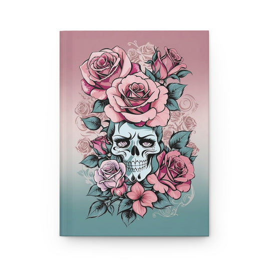 Notebook with a tattoo aesthetic skull and pink roses design on a pink and green gradient cover