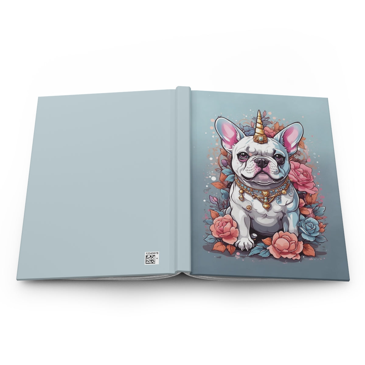 open notebook with an Illustration of a kawaii style white French bulldog wearing a unicorn horn and a necklace, surrounded by pastel colored flowers on a light blue background