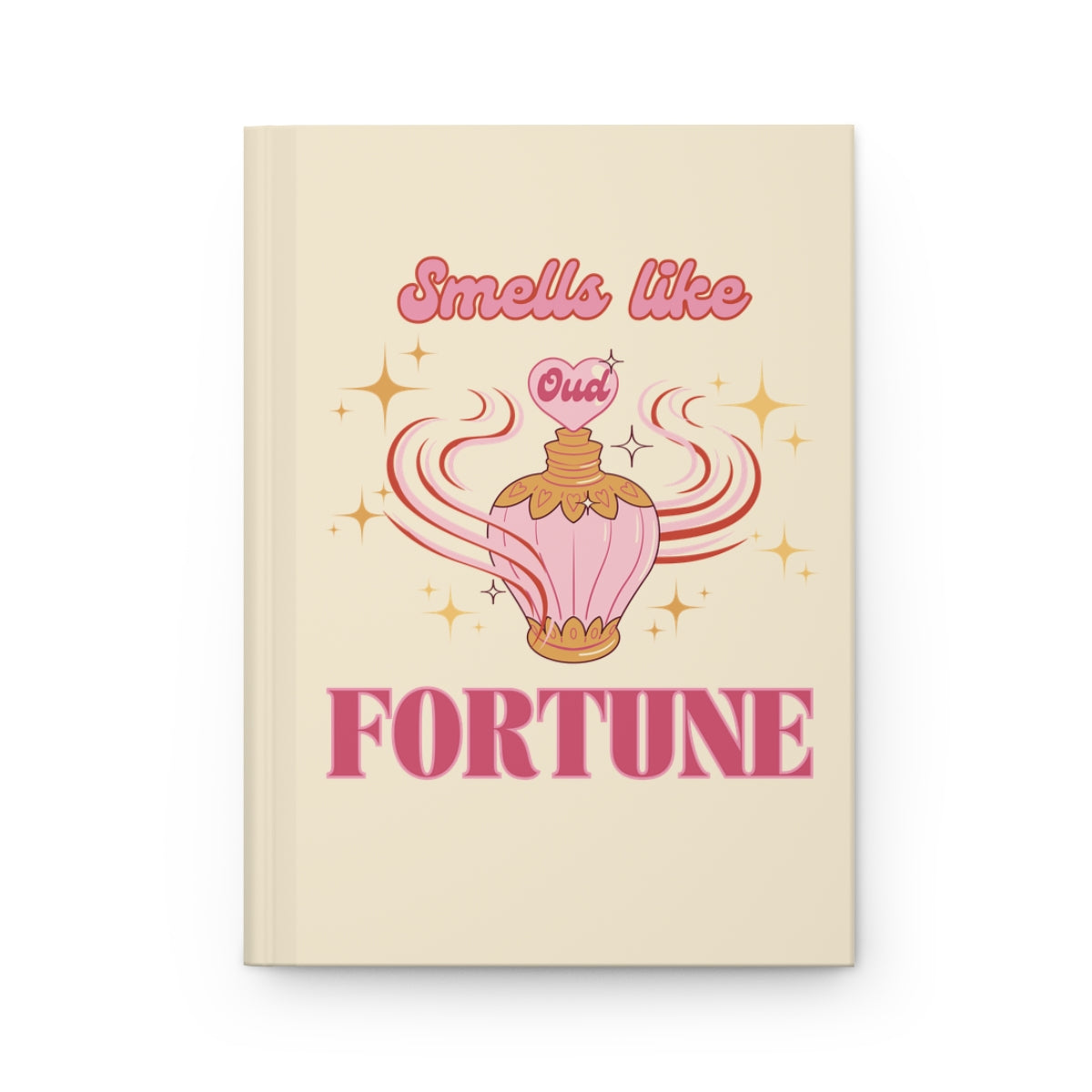 light pastel yellow hardcover journal with an illustration of a pink vintage oud perfume bottle and a retro aesthetic baby pink text "smells like fortune"