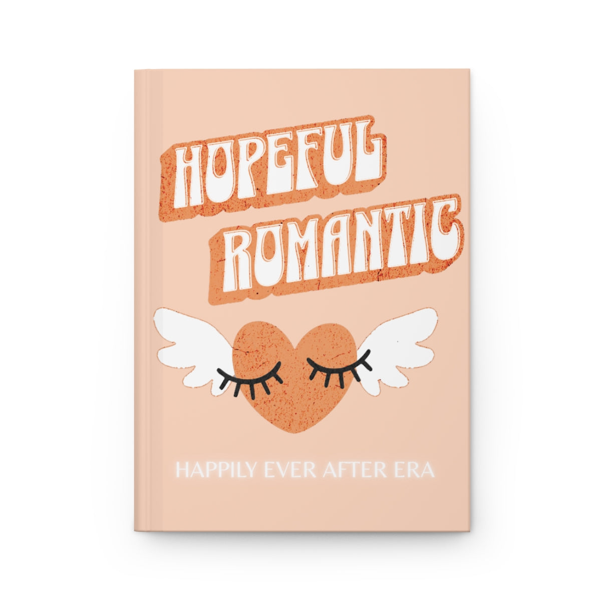 Notebook with 'Hopeful Romantic' text written in orange retro aesthetic letters and an orange heart with wings and eyelashes design, and "happily ever after era" text in white neon letters 