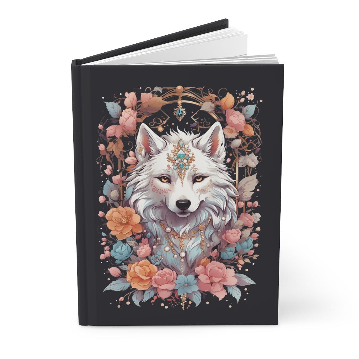 Notebook with an illustration of a boho chic style white wolf surrounded by flowers on a black background
