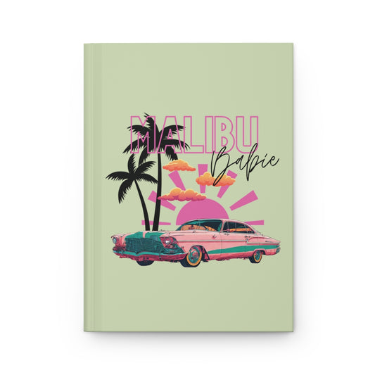 Pastel green journal with 'Malibu Babie' text featuring a pink vintage car, palm trees, and pastel colored sunset 