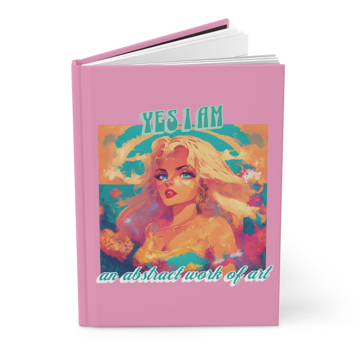 Bubblegum pink notebook with an illustration of a beautiful blonde woman with blue eyes on the cover, titled 'YES I AM an abstract work of art' in retro aesthetic letters