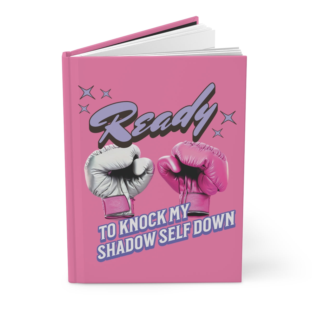 Pink notebook with boxing gloves and vintage retro style humorous text written in purple and retro aesthetic graphics on a pink background