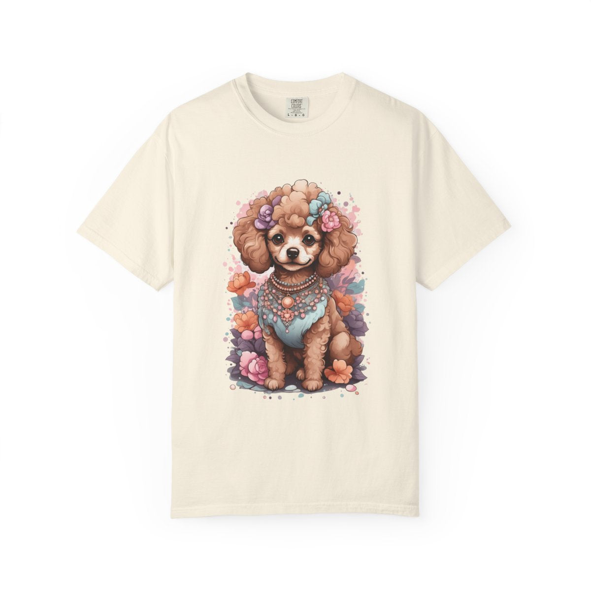 Beige t-shirt with a toy poodle dog dressed up, wearing a floral headband and necklace design 