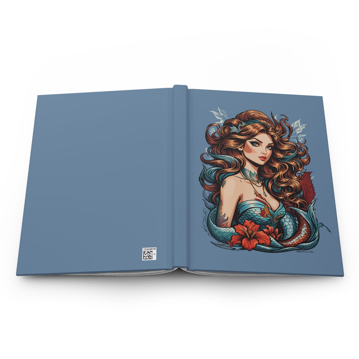 Open hardcover notebook with a tattoo art aesthetic mermaid illustration on a blue background