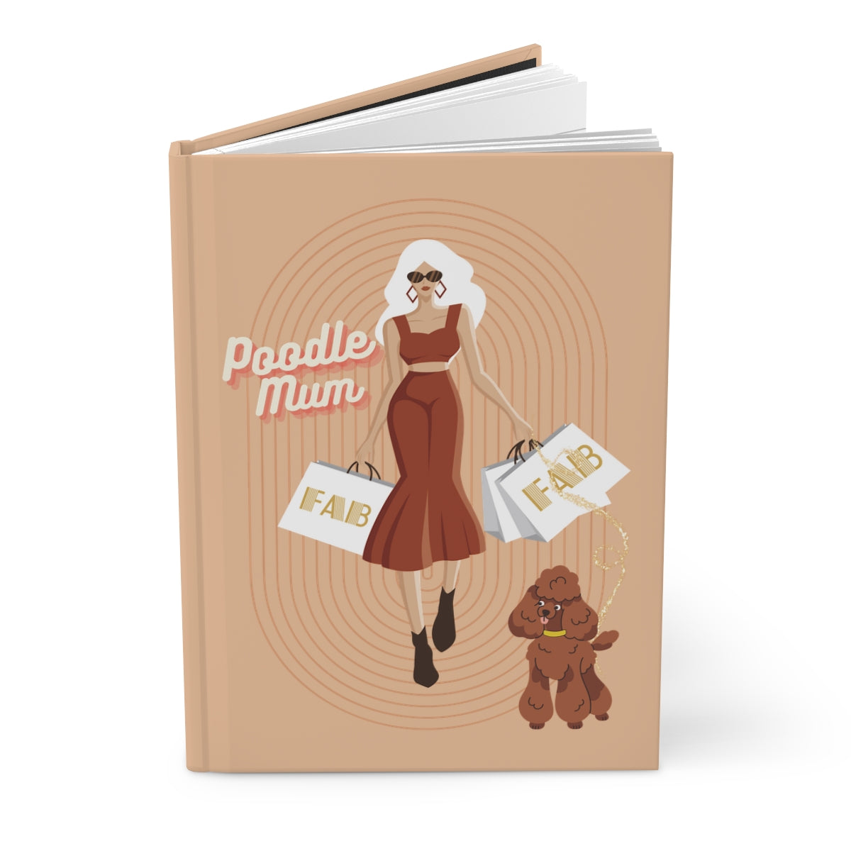 Journal with an Illustration of a super model looking young woman, dressed stylishly, wearing sunglasses and holding a toy poodle dog, carrying shopping bags that says "fab" on them, and text 'Poodle Mum' written in retro aesthetic letters on a beige background