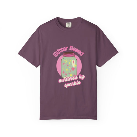 Purple t-shirt with a funny pastel pink graphic and text 