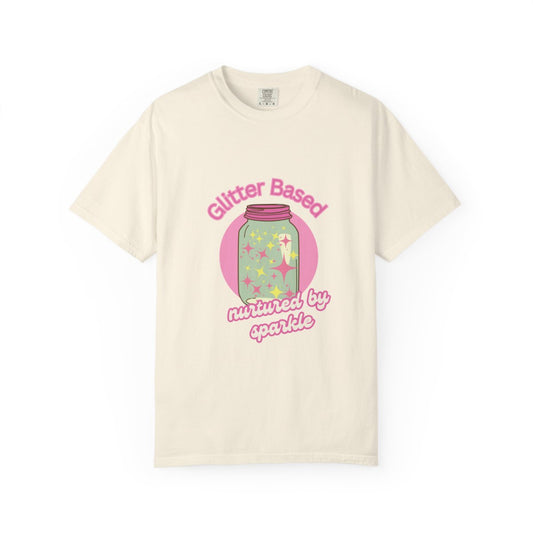 Beige t-shirt with a pastel colored graphic and a funny pink text in girly retro aesthetic